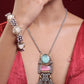 Eshra Necklace + Earrings